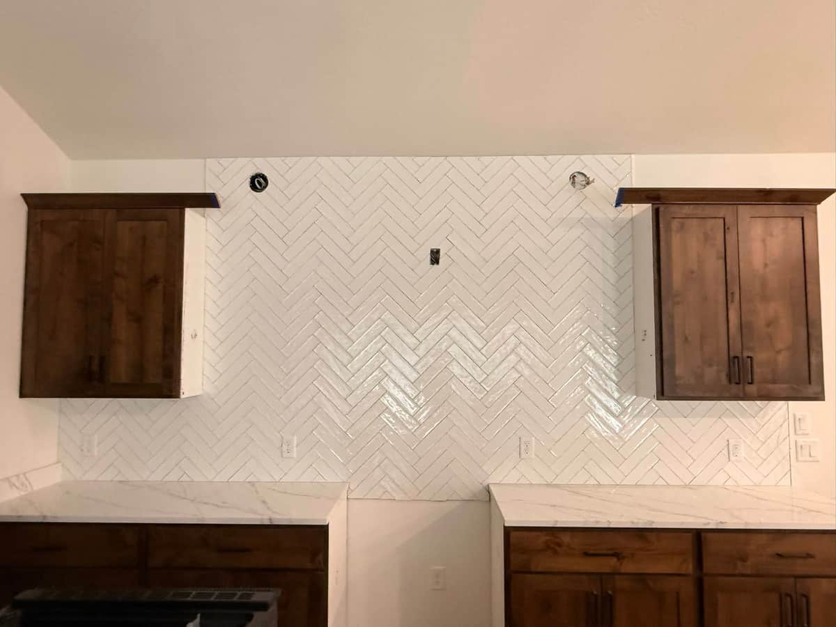 White herringbone backsplash